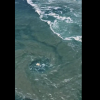 Impresionante vórtice en la Bahía Principal de Puerto Escondido: llaman a respetar las banderas