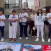 Madres buscadoras protestan frente al Monumento a la Revolución durante el Mundial de Futbol
