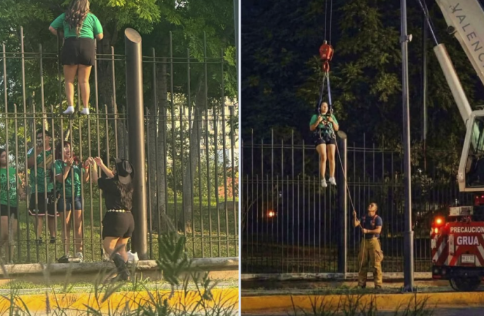 Joven es rescatada con grúa tras intentar ingresar ilegalmente al Fan Fest de Monterrey